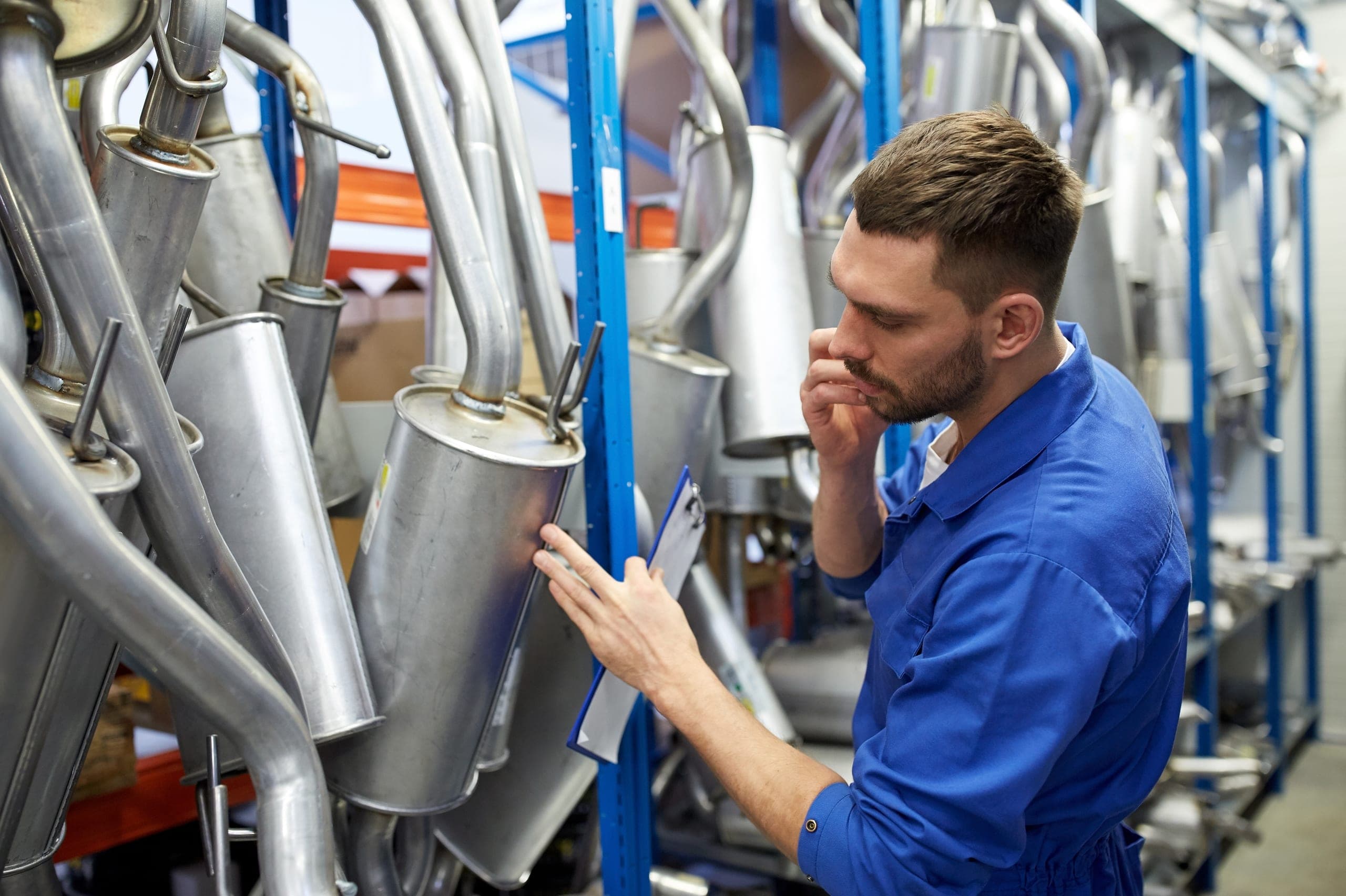 Mechanic on the phone in an auto shop